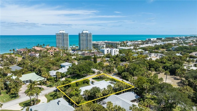 drone / aerial view featuring a water view