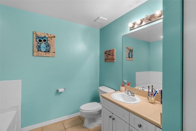 2416 57th Cir Unit 2416, Vero Beach, FL 32966 - full bath with a garden tub, vanity, tile patterned floors, a textured ceiling, and a textured wall