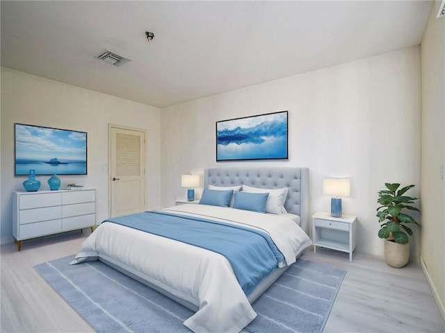 bedroom featuring light hardwood / wood-style flooring