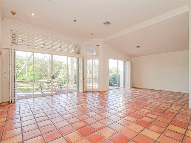 tiled spare room with lofted ceiling and crown molding