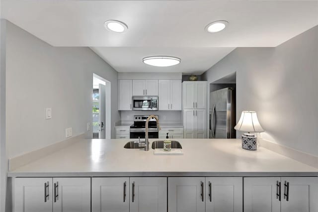 kitchen featuring white cabinets and stainless steel appliances