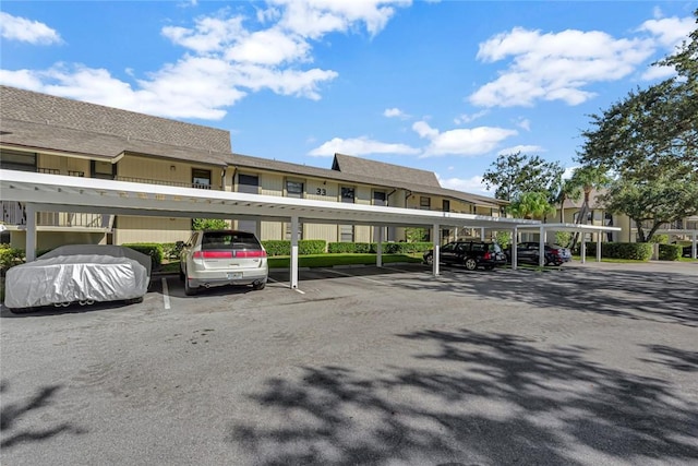 33 Plantation Dr Unit 104, Vero Beach, FL 32966 - view of covered parking lot