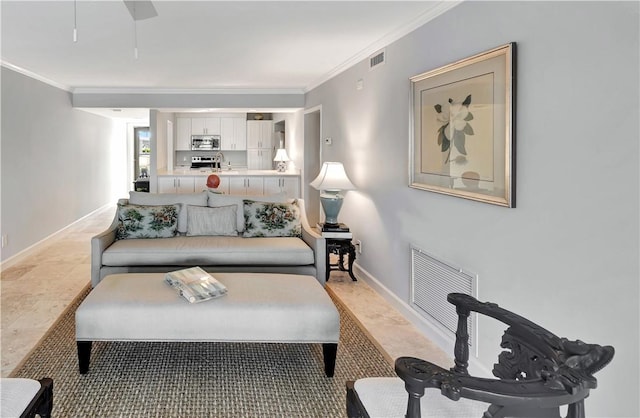 33 Plantation Dr Unit 104, Vero Beach, FL 32966 - living room featuring ornamental molding and ceiling fan