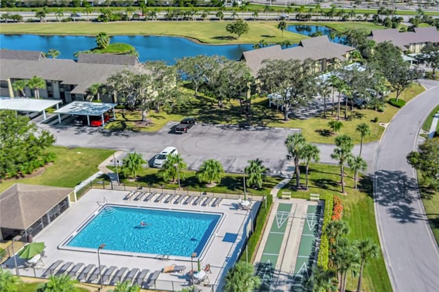 birds eye view of property featuring a water view