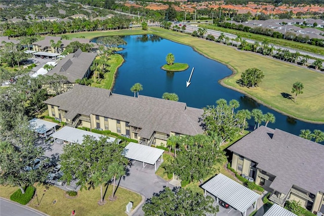 33 Plantation Dr Unit 104, Vero Beach, FL 32966 - aerial perspective of suburban area featuring a large body of water and a golf course