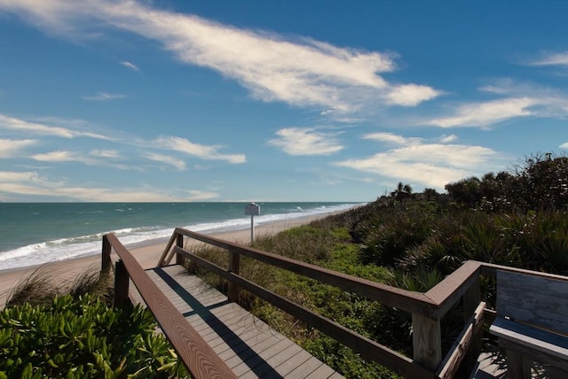 property view of water featuring a beach view