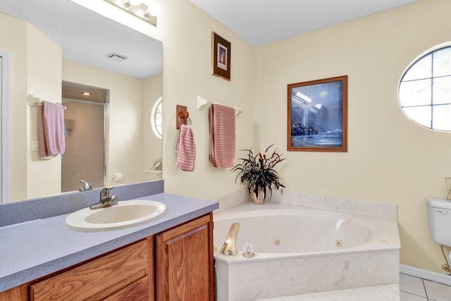 132 Keystone Dr, Sebastian, FL 32958 - full bathroom featuring plenty of natural light, a jetted tub, and vanity