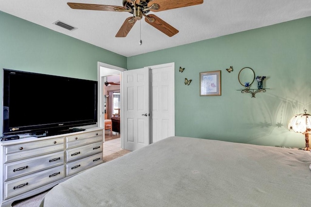 132 Keystone Dr, Sebastian, FL 32958 - bedroom featuring light tile patterned floors and ceiling fan