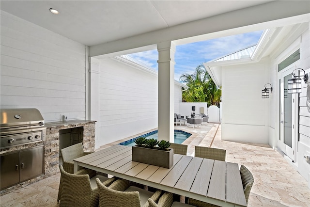 view of patio / terrace featuring an outdoor kitchen and grilling area