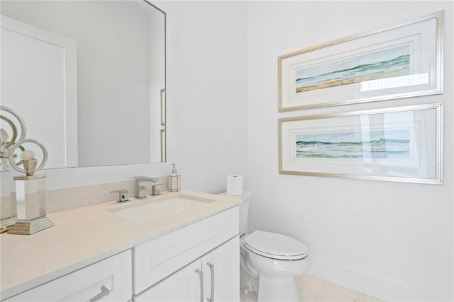 20 Strand Dr, Vero Beach, FL 32963 - half bath with vanity, toilet, and baseboards
