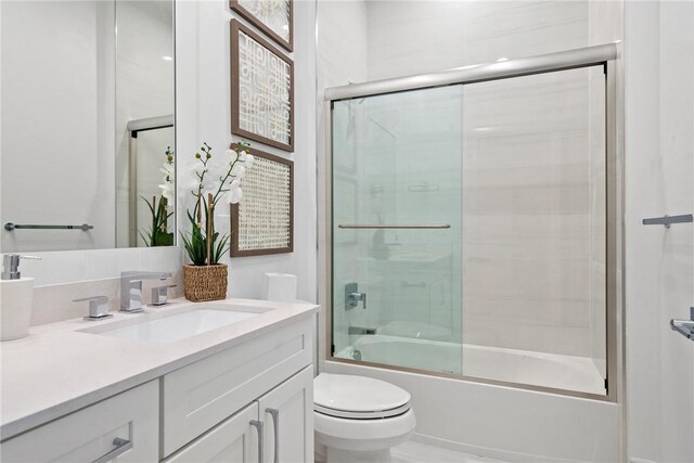 20 Strand Dr, Vero Beach, FL 32963 - full bath with toilet, vanity, and combined bath / shower with glass door
