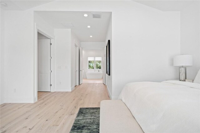20 Strand Dr, Vero Beach, FL 32963 - bedroom featuring light wood-type flooring, recessed lighting, and baseboards