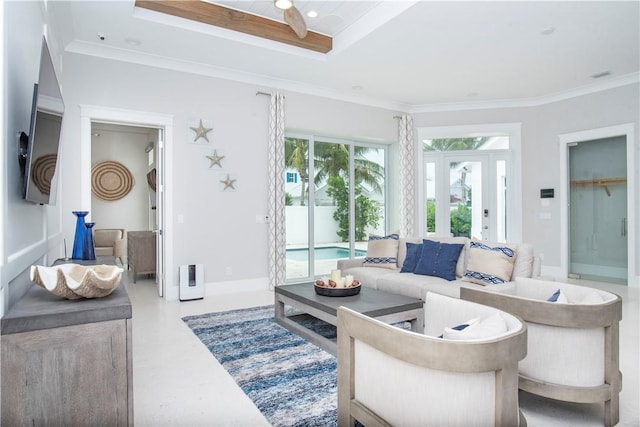 95 Strand Dr, Vero Beach, FL 32963 - living room with a raised ceiling, a ceiling fan, and ornamental molding