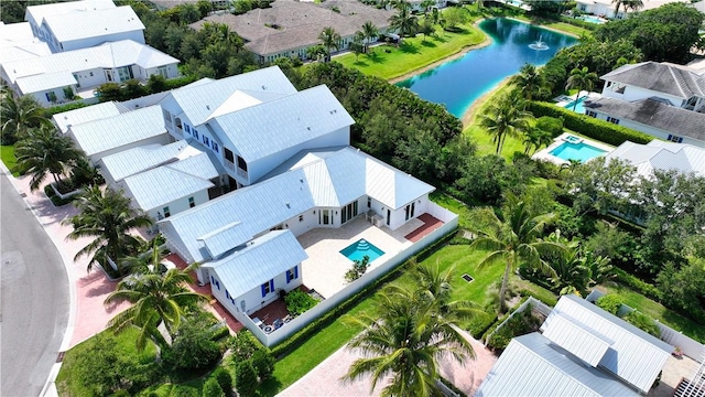 95 Strand Dr, Vero Beach, FL 32963 - drone / aerial view of a pool area and a nearby body of water
