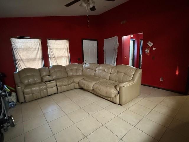 living room with light tile patterned floors and ceiling fan