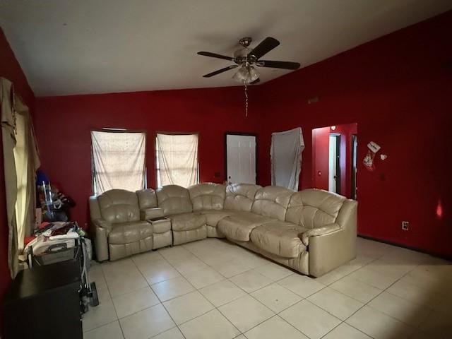 tiled living room with ceiling fan