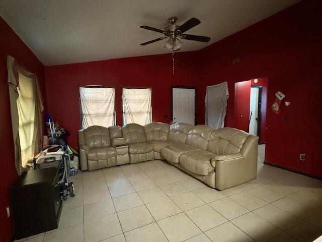 tiled living room featuring ceiling fan