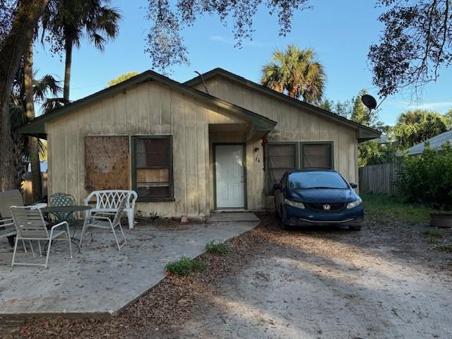 view of front facade with a patio area