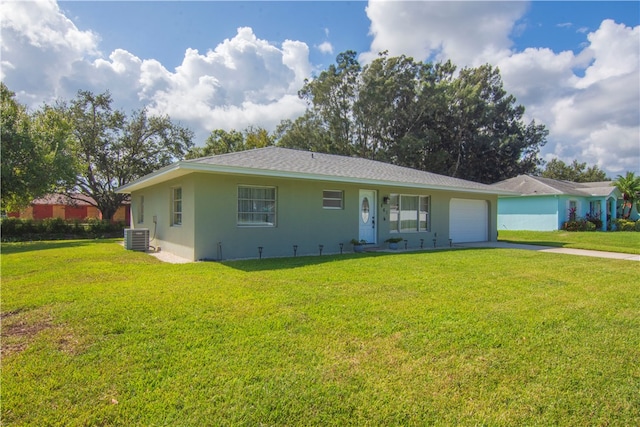 single story home with central AC unit, a garage, and a front yard