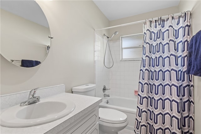 full bathroom with vanity, toilet, and shower / tub combo