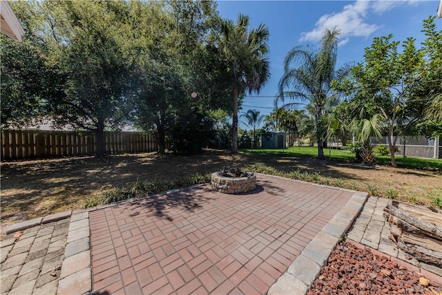 view of patio / terrace with a fire pit