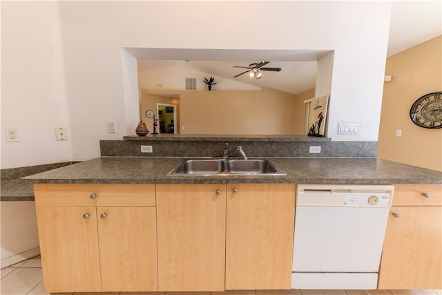 kitchen with vaulted ceiling, dishwasher, kitchen peninsula, sink, and light brown cabinetry