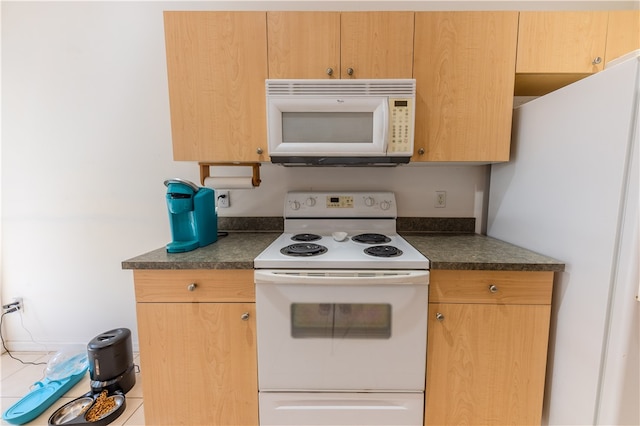 kitchen featuring white appliances