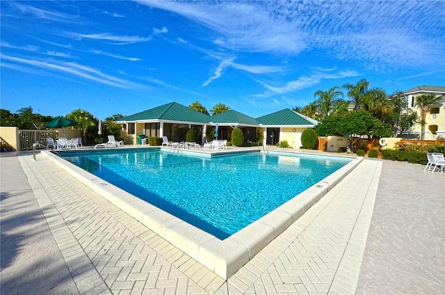 view of swimming pool featuring a patio