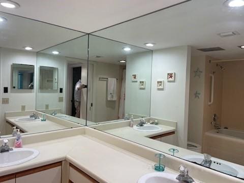 full bathroom featuring vanity, shower / bathtub combination, and toilet