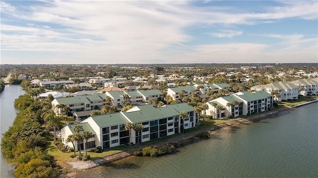 drone / aerial view with a water view