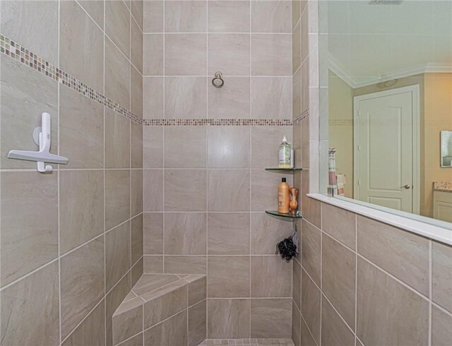 laundry room featuring cabinets, independent washer and dryer, crown molding, and sink