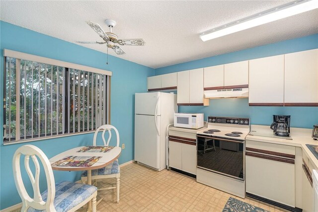 kitchen featuring ceiling fan, white cabinetry, white appliances, and a textured ceiling