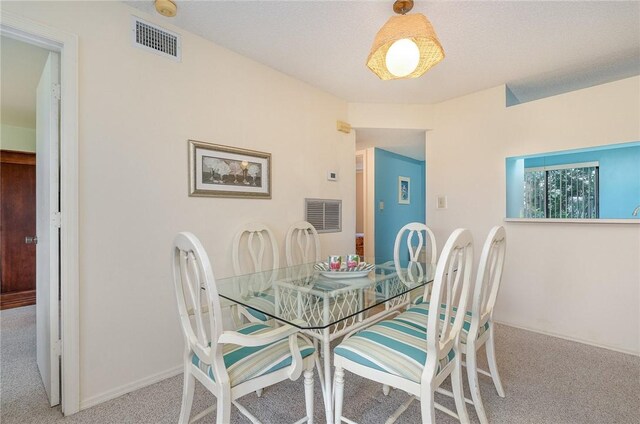 dining room with carpet flooring