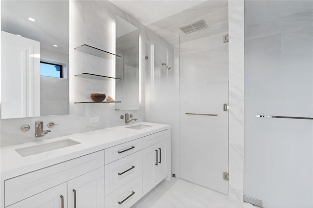 bathroom with vanity and walk in shower