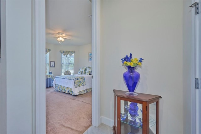 bedroom with light colored carpet