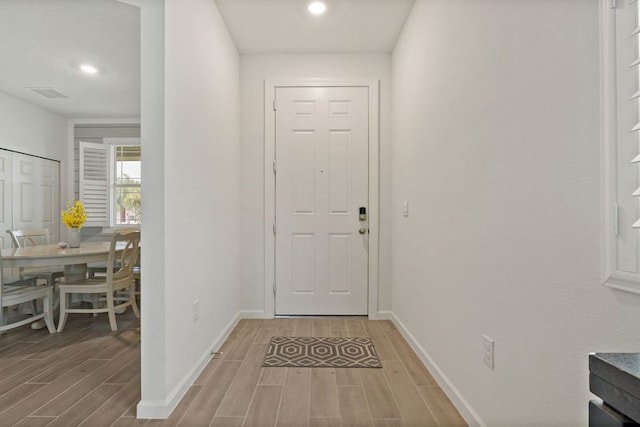 doorway to outside featuring light hardwood / wood-style flooring