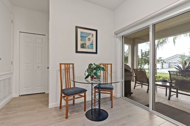 dining room featuring light hardwood / wood-style flooring