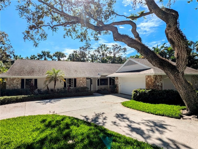 single story home featuring a garage