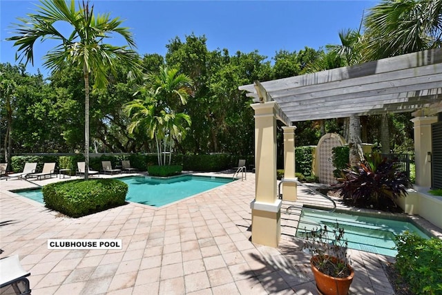 view of pool with a patio and a pergola