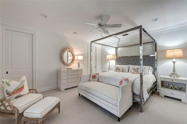 bedroom with crown molding and light colored carpet