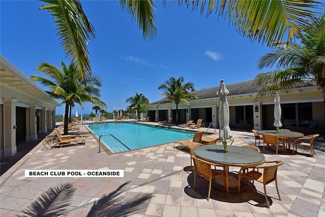 view of swimming pool featuring a patio