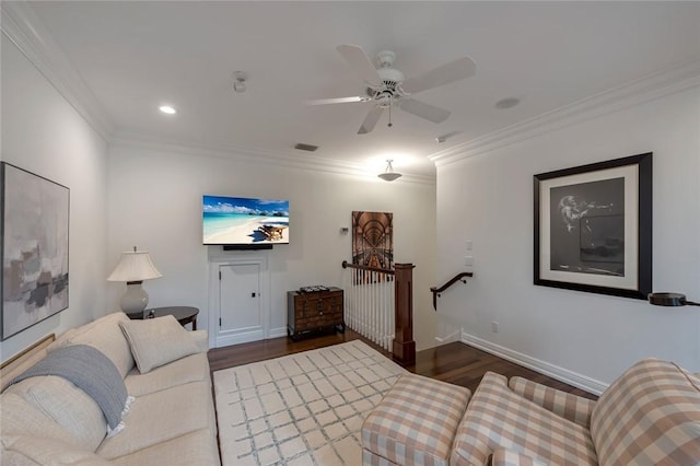 living room featuring crown molding, dark hardwood / wood-style floors, and ceiling fan