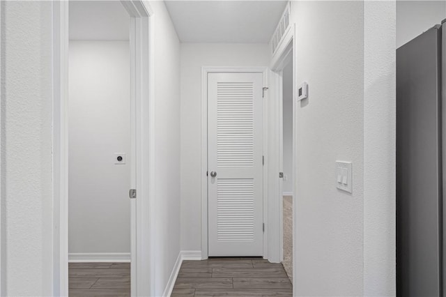 7860 97th Ave, Vero Beach, FL 32967 - hall with wood finished floors and baseboards