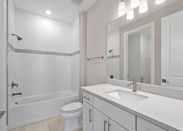 1251 Haven Unit Prestige 37, Vero Beach, FL 32960 - full bathroom featuring toilet, bathing tub / shower combination, vanity, and recessed lighting