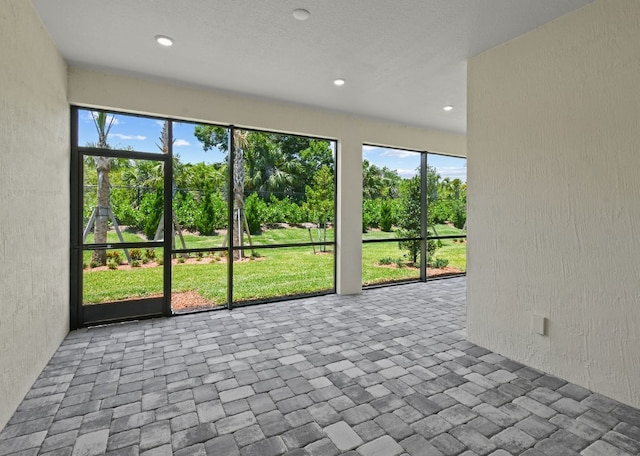 1251 Haven Unit Prestige 37, Vero Beach, FL 32960 - unfurnished sunroom featuring healthy amount of natural light
