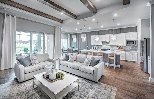 1251 Haven Unit Prestige 37, Vero Beach, FL 32960 - living area with beam ceiling, dark wood-type flooring, and recessed lighting