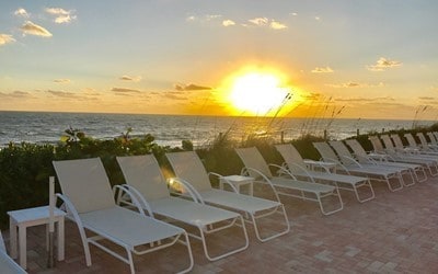 patio terrace at dusk with a water view