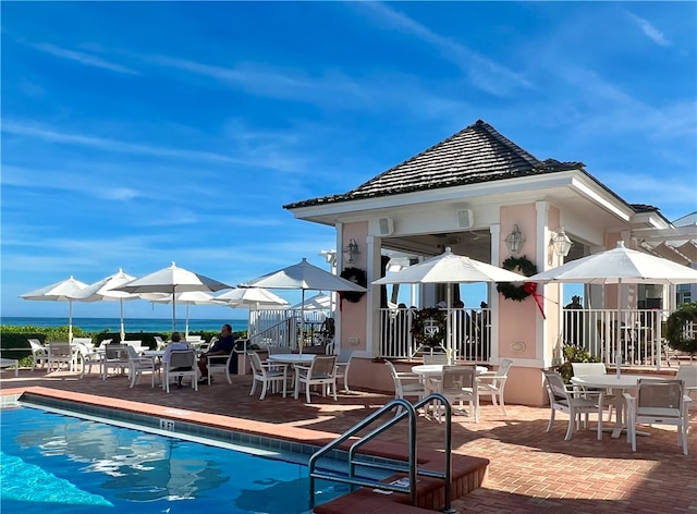 view of pool with a gazebo and a patio area