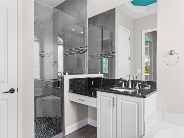1745 Belmont Cir SW, Vero Beach, FL 32968 - bathroom featuring a shower stall, vanity, and a bathtub