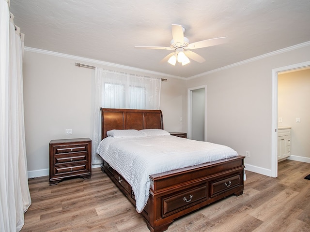 bedroom with light hardwood / wood-style flooring, ceiling fan, and ornamental molding